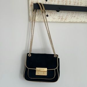 Michael Kors black suede with gold hardware bag